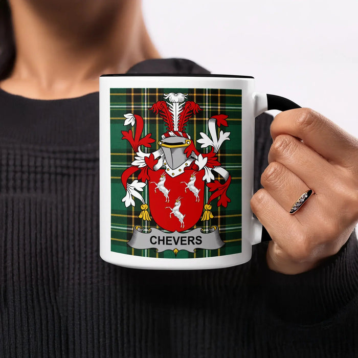 Chevers heritage mug featuring the family crest, black handle and tartan design.
