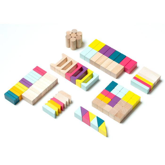 The Cubika Wooden Blocks Construction Kit by Cubika features eco-friendly, colorful wooden blocks in various shapesโrectangles, cylinders, triangles, and cubesโarranged on a white background for creative play.