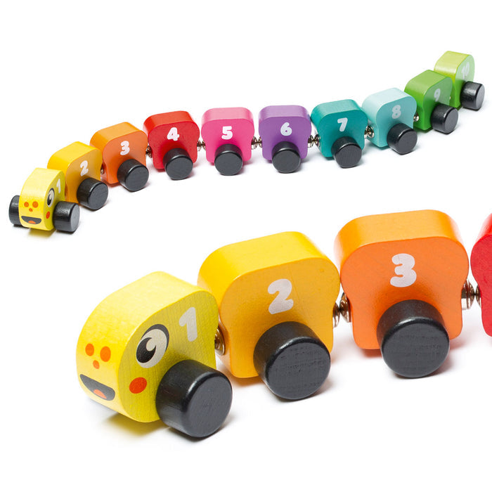 The Cubika Wooden Toy Rainbow Caterpillar by Cubika is an organic wood toy with 10 colorful, numbered segments and a yellow head featuring painted eyes and a smile.
