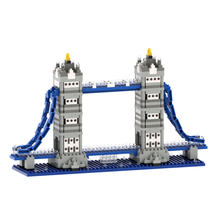 The Brixies Large Gift Box Tower Bridge is a micro-brick construction kit featuring gray, blue, and white blocks with two tall towers and blue suspension cables, capturing the charm of this iconic landmark.