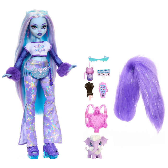 The Mattel Monster High Abbey Doll by Mattel features blue skin, long blue and purple hair, a white crop top, purple furry jacket, patterned pants, a purple tail, pet wooly mammoth, backpack, drink accessory, and makeup items.