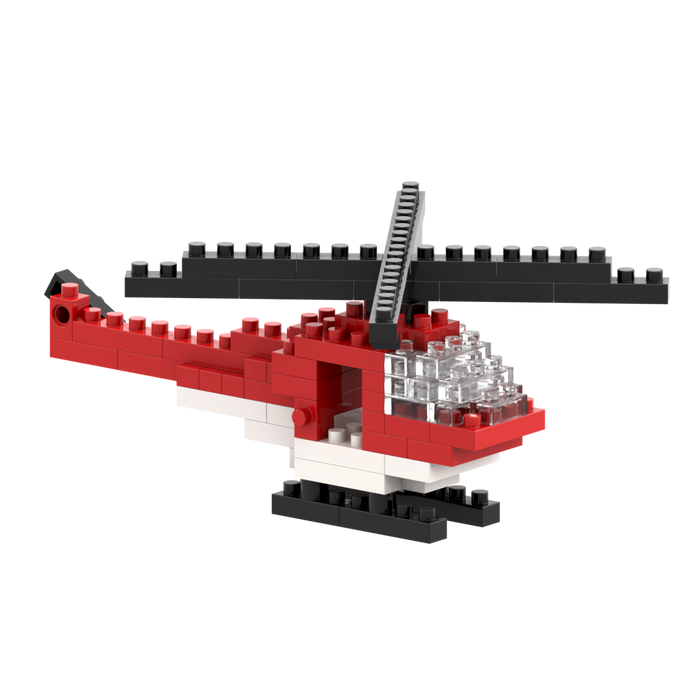 The Brixies Postcard Helicopter is a mini build kit made from red, white, and black micro bricks, with a large black rotor and clear cockpit. Ideal for collectors or as a unique postcard gift. Set against a plain white background.