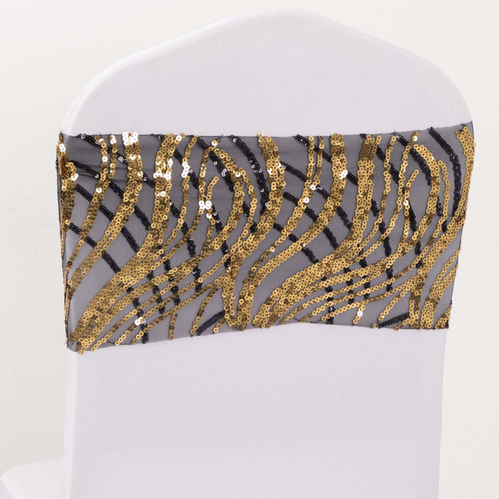Gold and silver sequin chair sash with zebra stripes on a white chair.