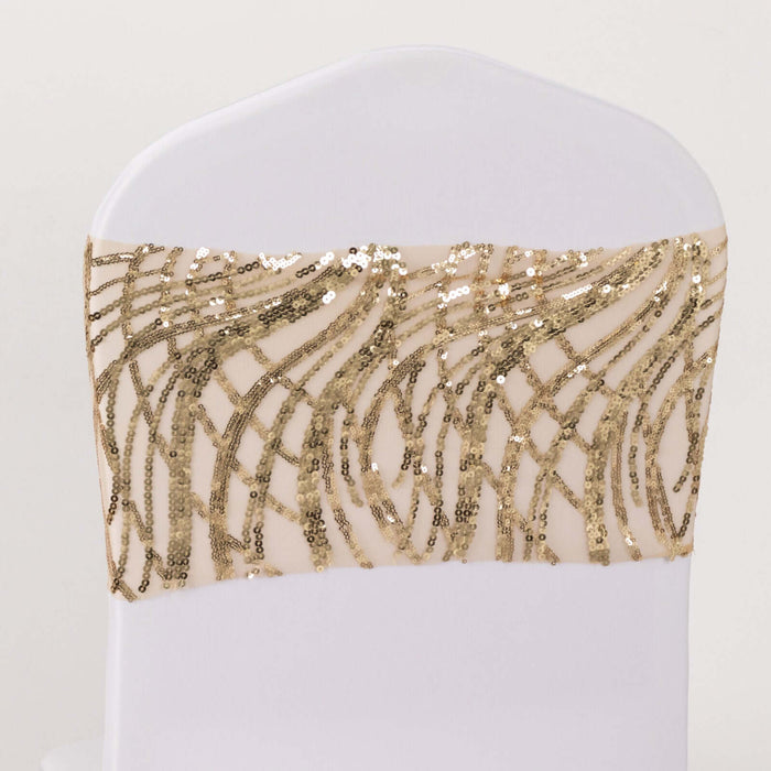 Gold sequin chair sash with elegant wave design on a white chair.