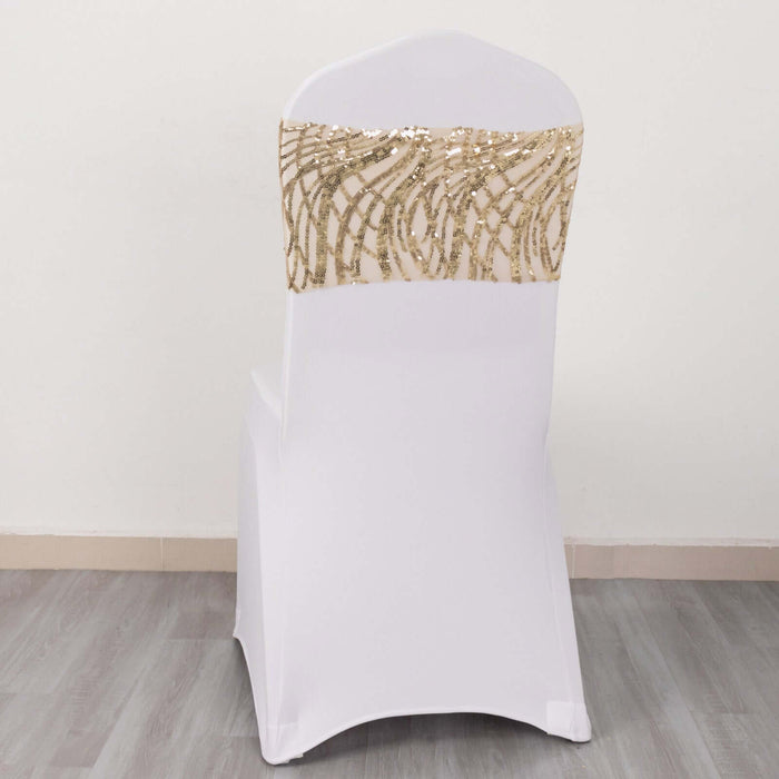 White chair cover with gold sequined design on the back.