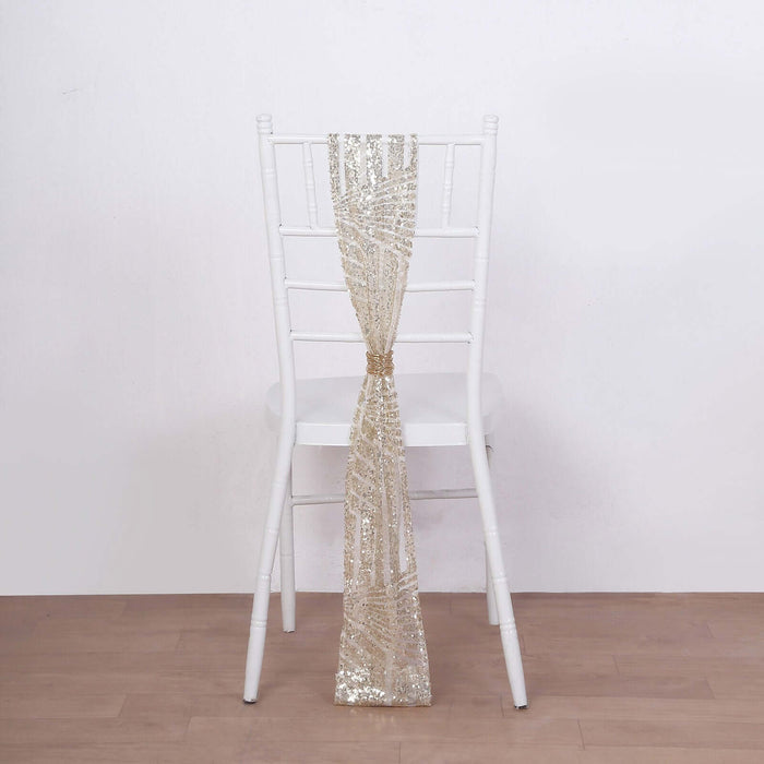 Gold sequin chair sash draped on a white chiavari chair.