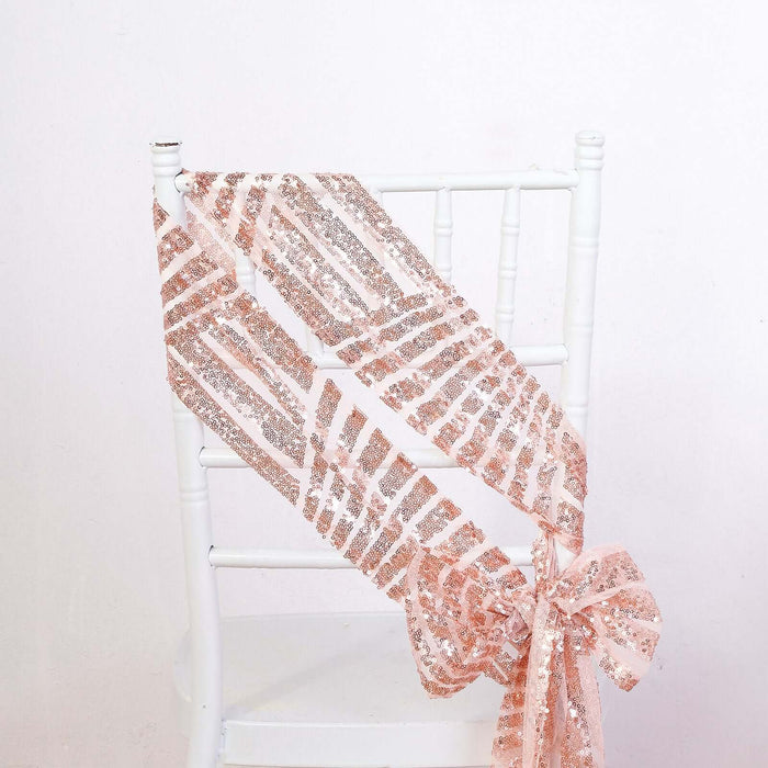 Rose gold sequin sash draped on a white chair.