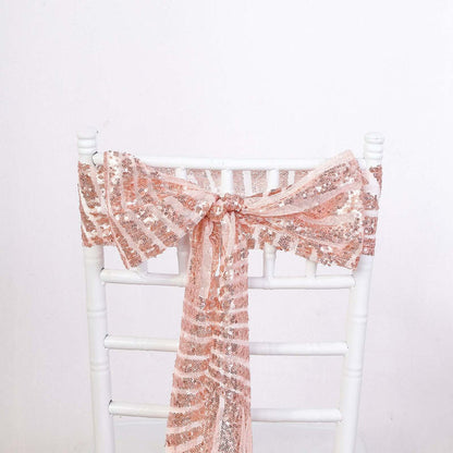 Rose gold lace chair sash tied in a bow on a white chiavari chair.