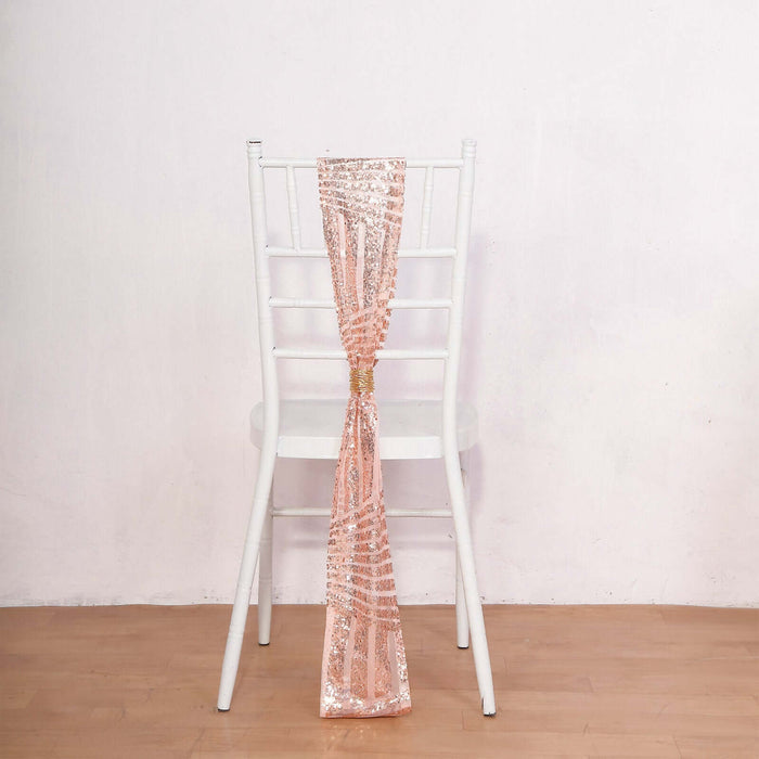 Pink sequin chair sash elegantly draped on a white chair.