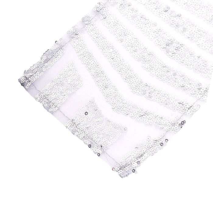 Silver sequin fabric with geometric patterns on a white background. #whtbkgd
