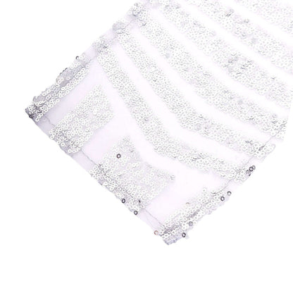 Silver sequin fabric with geometric patterns on a white background. #whtbkgd
