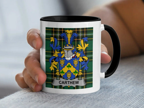 Carthew Irish surname mug with family crest on an Irish National Tartan background.
