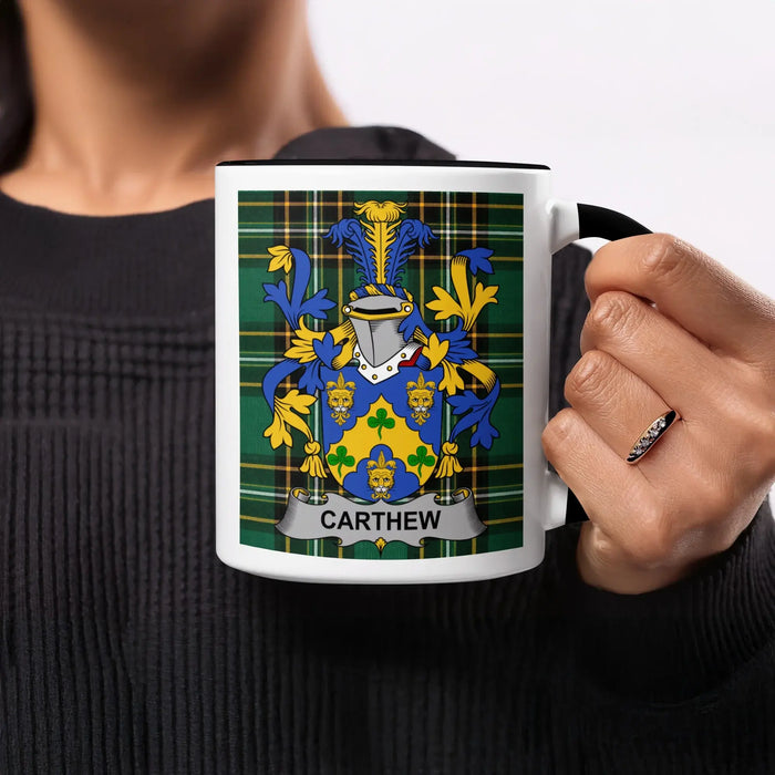 Carthew heritage mug featuring the family crest, black handle and tartan design.