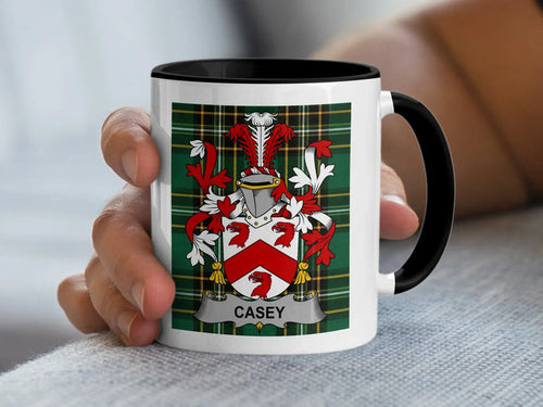 Casey Irish surname mug with a family-name shield on an Irish National Tartan background.
