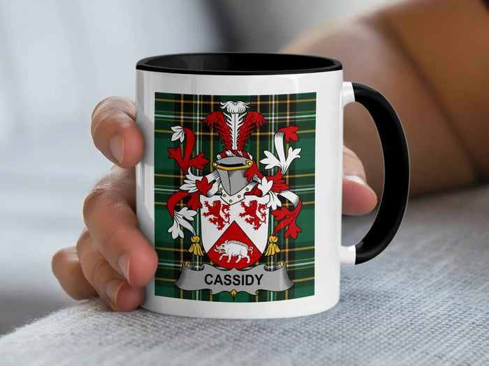 Cassidy Irish surname mug with family crest on an Irish National Tartan background.