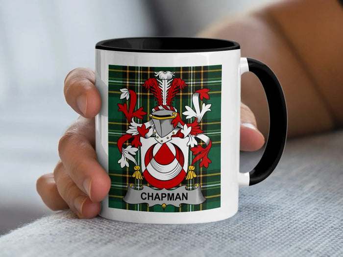 Chapman Irish surname mug with family crest on an Irish National Tartan background.