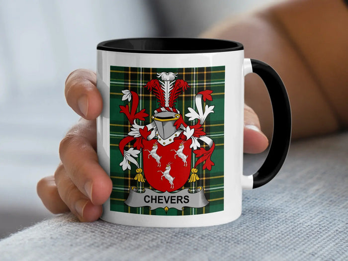 Chevers Irish surname mug with family crest on an Irish National Tartan background.