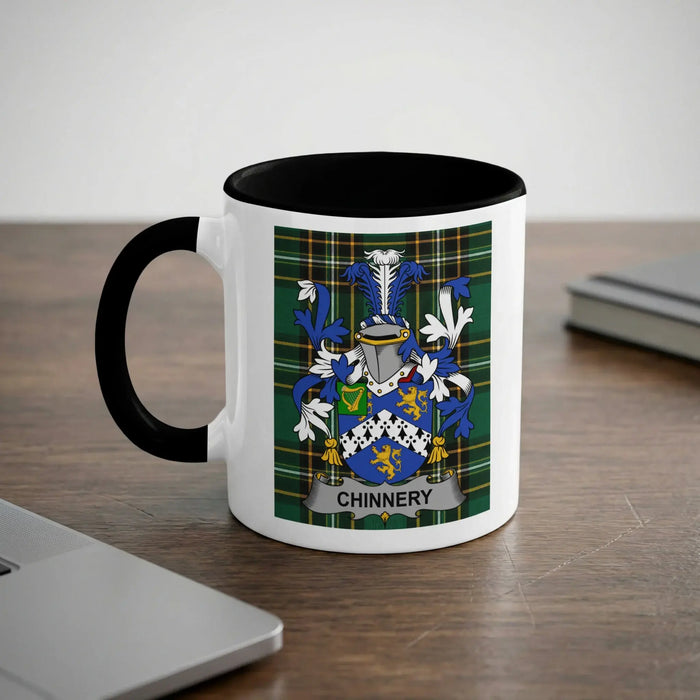 Chinnery 11oz ceramic mug with black rim and surname emblem on Irish tartan.