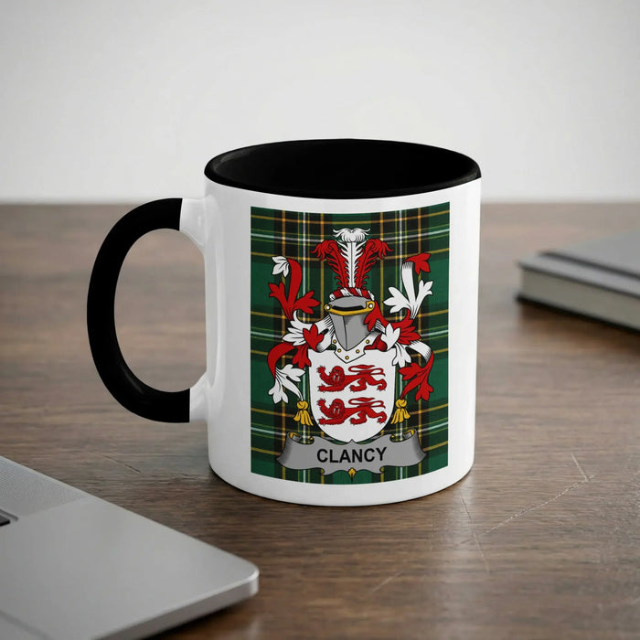 Clancy 11oz ceramic mug with black rim and surname emblem on Irish tartan.