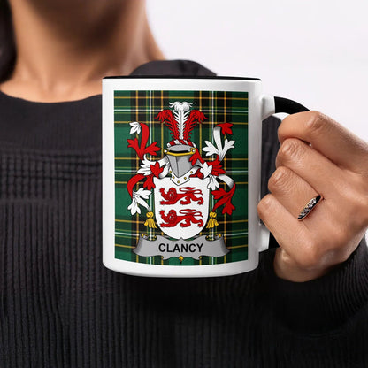Clancy heritage mug featuring the family crest, black handle and tartan design.