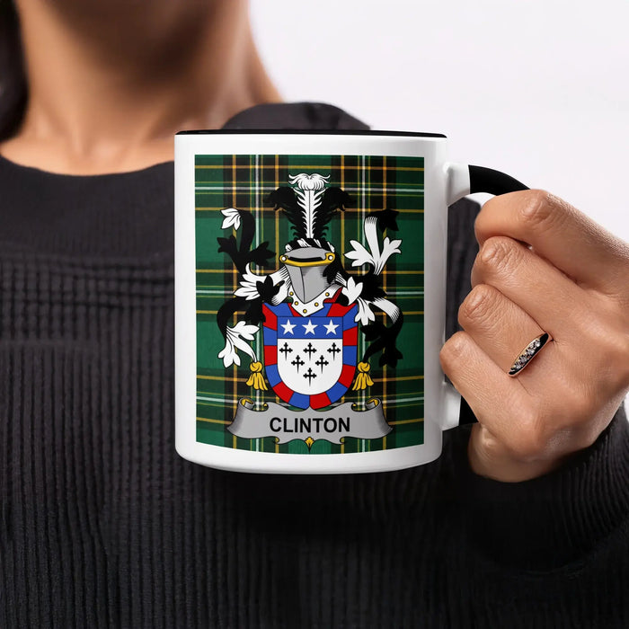 Clinton heritage mug featuring the family crest, black handle and tartan design.