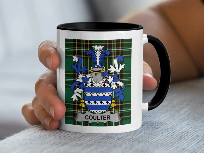 Mug with Coulter family crest on tartan background.
