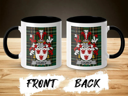 White mug with black rim and handle, featuring Courcy coat of arms.