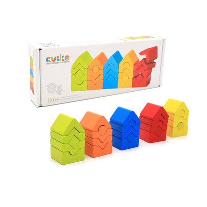 The Cubika Wooden Set of Towers by Cubika features colorful house-shaped stackable blocks in green, orange, blue, red, and yellow. This educational toy fosters creativity and fine motor skills, shown displayed in front of the “KUBIKA” box.