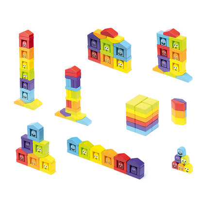 The Cubika Wooden Construction Set Colorful Houses by Cubika features bright, primary-colored stacking blocks made from organic Carpathian wood, some with smiling faces, perfect for building towers, walls, and rows.