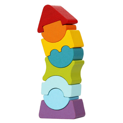 The Cubika Wooden Flexible Tower by Cubika features colorful wooden blocks stacked vertically with a red triangle on top, resembling a rocket—an engaging and sustainable toy for creative play, set against a white background.