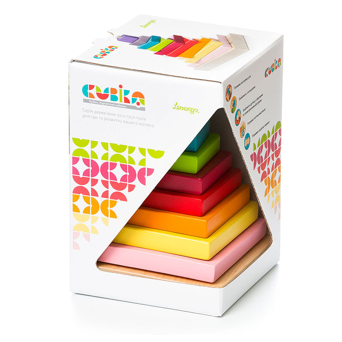 The Cubika Wooden Pyramid by Cubika is a boxed set of colorful wooden stacking blocks, made from organic wood in a stepped pyramid shape, with geometric-patterned packaging that promotes fine motor skills development.