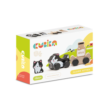 The Cubika Wooden Toy Clever Kitties set by Cubika, for ages 18 months+, comes in a colorful box and features eco-friendly wooden kitties and a milk cart on wheels, shown on the package front.
