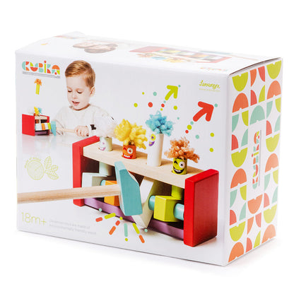 Bright Cubika packaging shows a child playing with the Cubika Wooden Toy Jumping Clowns set, featuring eco-friendly wood, smiling blocks, geometric shapes, and jumping clowns to build motor skills. For ages 18 months and up.