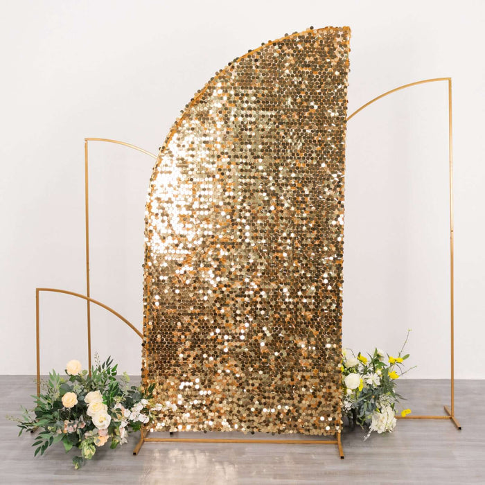 Gold sequin backdrop with floral arrangements for events and photography.