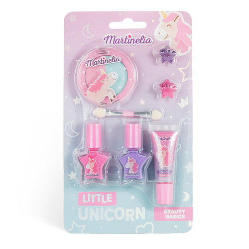 The Martinelia Little Unicorn Beauty Basics by Martinelia is a pastel, kid-friendly makeup set with unicorn-themed packaging. It includes two nail polishes, lip gloss, eyeshadow, an applicator, and two hair clips.