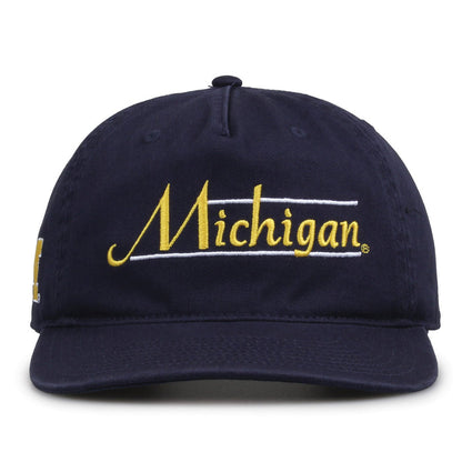Michigan Wolverines Original Heritage Bar Snapback in navy, front view of embroidered school script and bar design