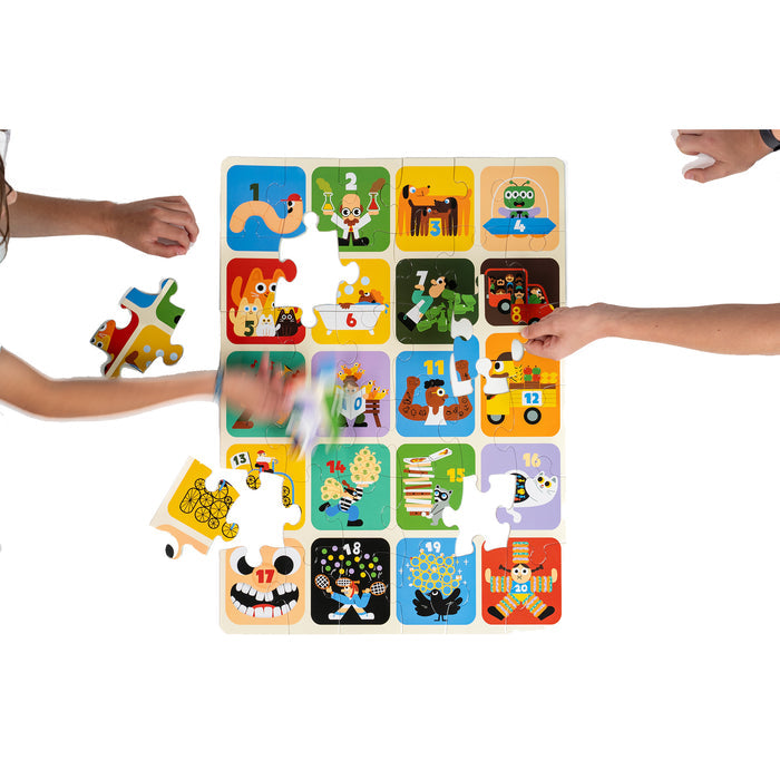 Three people assemble the Nolja Easy As 1,2,3 36pc Jigsaw Puzzle by Nolja, featuring vibrant pieces with animal illustrations and numbers on colorful backgrounds. The nearly finished puzzle encourages fun early learning.