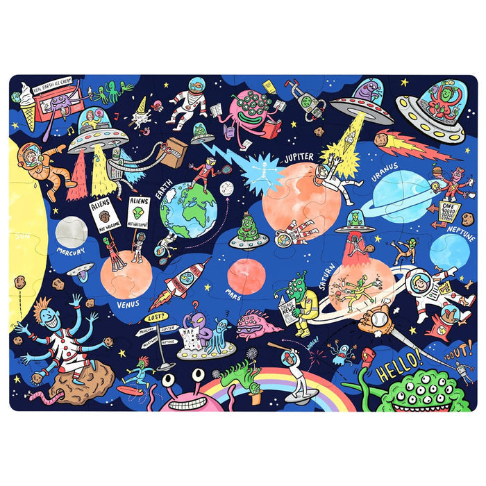 The Nolja Space 36pc Jigsaw Puzzle by Nolja features colorful, cartoon astronauts, aliens, UFOs, and planets like Jupiter, Venus, Saturn, and Neptune on a starry background. Some fun characters wave and say HELLO!.