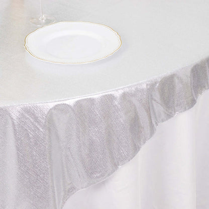 Silver tablecloth draping elegantly over a table.
