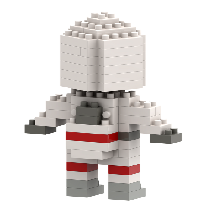 The Brixies Postcard Astronaut is a micro brick figure, mostly white with gray hands, boots, and backpack, plus red leg stripes, shown against a plain white background.