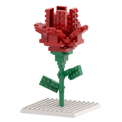 The Brixies Postcard Flower is a 3D red rose with a green stem and two leaves, standing upright on a white baseplate—perfect as a miniature build kit or unique mailable postcard against a plain white background.