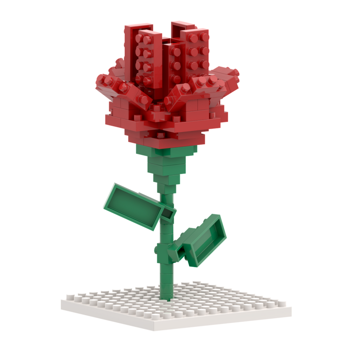 The Brixies Postcard Flower features a vibrant red 3D rose with green stem and leaves, built from bricks, standing upright on a white baseplate against a plain white background.