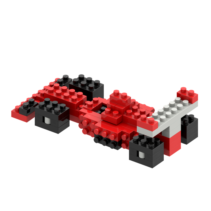 The Brixies Postcard Racing Car is a toy race car made from interlocking micro bricks in red, black, and white with a low profile, four wheels, and a large rear spoiler—an ideal addition to any mini build kit.