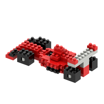 The Brixies Postcard Racing Car is a toy race car made from interlocking micro bricks in red, black, and white with a low profile, four wheels, and a large rear spoiler—an ideal addition to any mini build kit.