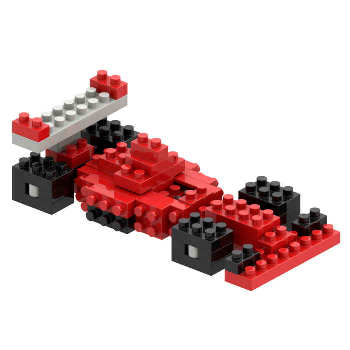The Brixies Postcard Racing Car, built from red, black, and white micro bricks, is displayed on a plain white background.