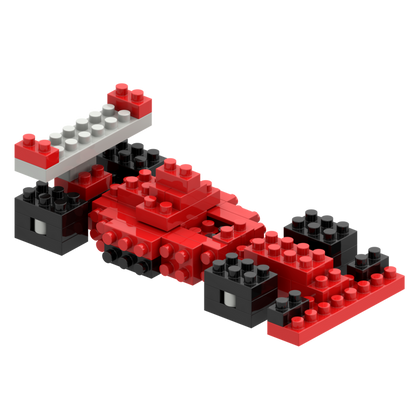 The Brixies Postcard Racing Car, built from red, black, and white micro bricks, is displayed on a plain white background.