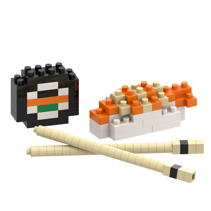 Brixies Postcard Sushi features toy building blocks arranged as a 3D sushi roll, nigiri with orange topping, and chopsticks on a white background—ideal as a mini build kit or unique mailable postcard gift.