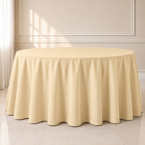 beige seamless round tablecloth on a table