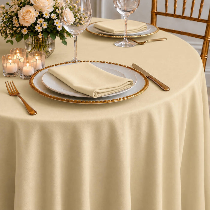 beige premium polyester round tablecloth on a dining table