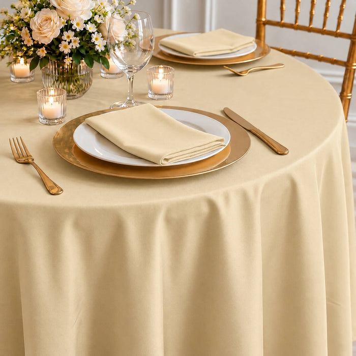 beige seamless round tablecloth on dining table